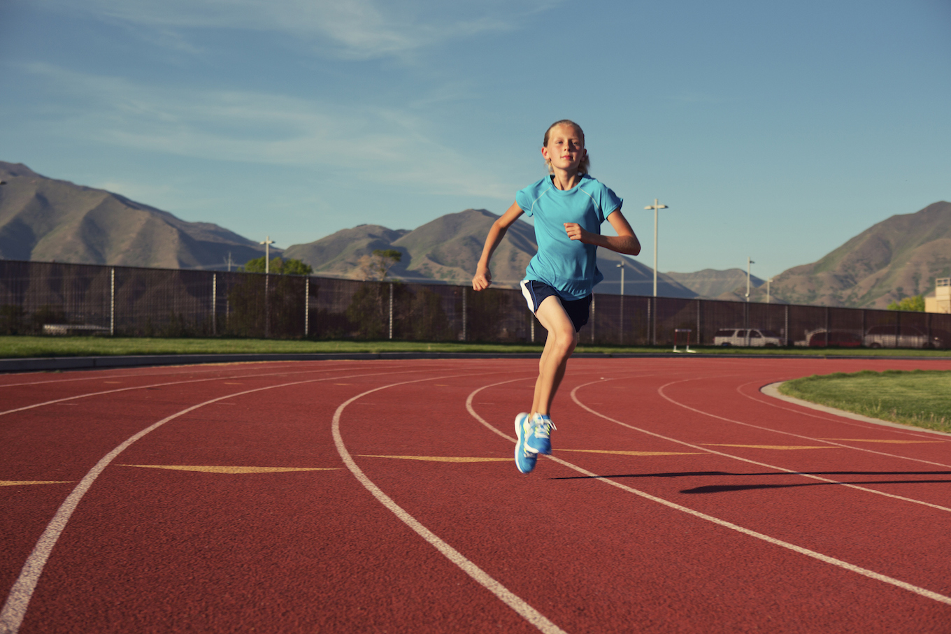 girl running track